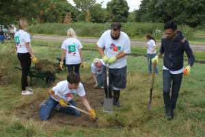 Volunteering group carrying out tasks in Nene Park