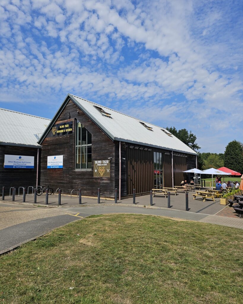 External view of a building which is the Blind Tiger Taproom and Kitchen at Orton Meadows, Peterborough.