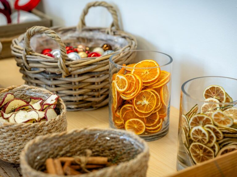 baskets and jars of christmas wreath decorations at a craft workshop