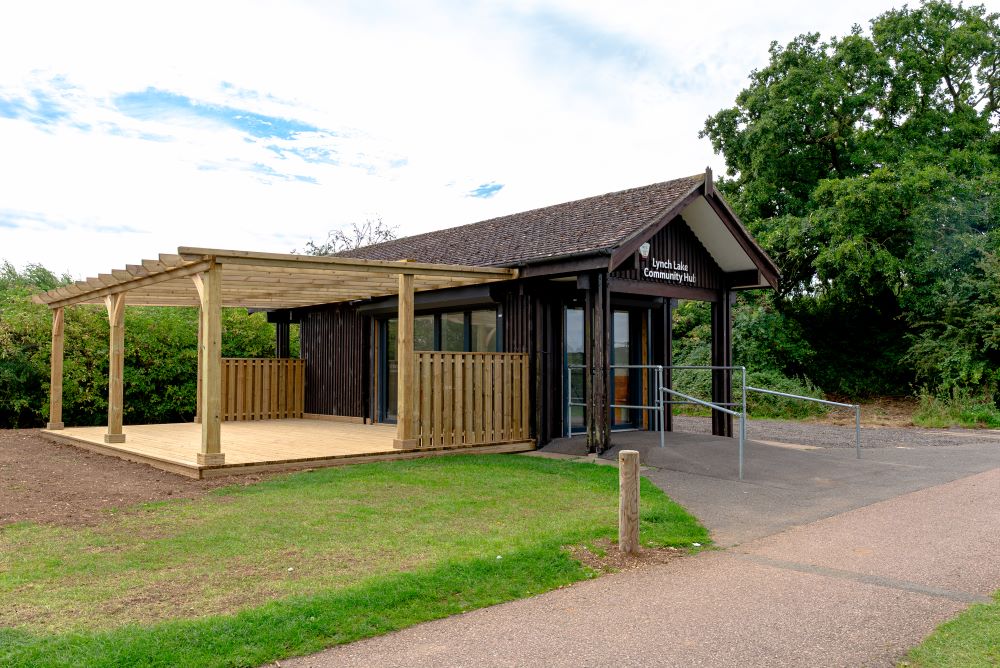external view of Lynch Lake Community Hub with a wooden veranda to the side