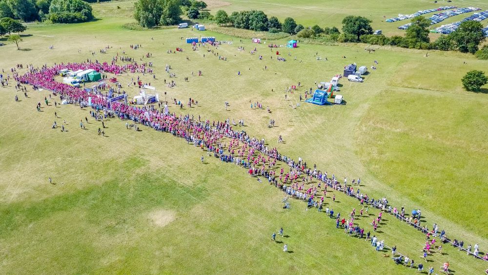 drone view over a charity fun run at Ferry Meadows