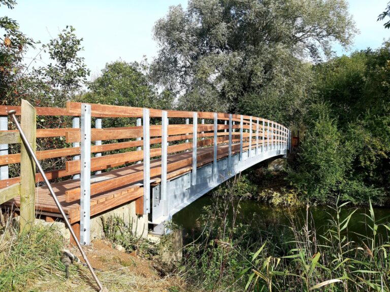 New wooden and metal bridge over the River Nene at Thorpe Meadows in Peterborough.