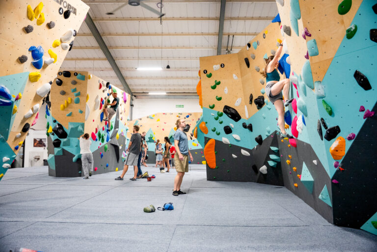 Inside of a bouldering climbing centre.