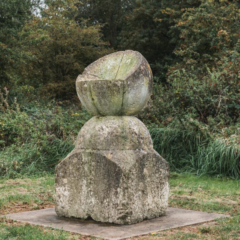 stone sculpture set in a landscape setting.