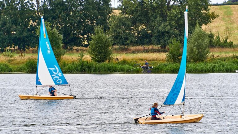 Two small sailing boats on a lake
