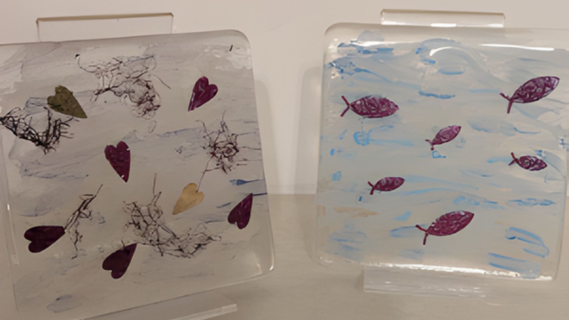 Two craft made glass coasters