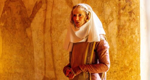 Medieval costumed female character at Longthorpe Tower