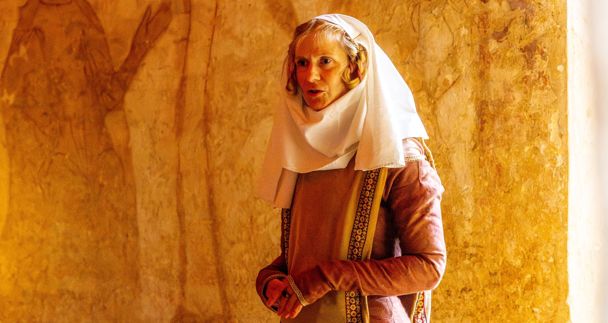 Medieval costumed female character at Longthorpe Tower