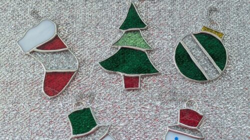 A selection of stained glass christmas decorations